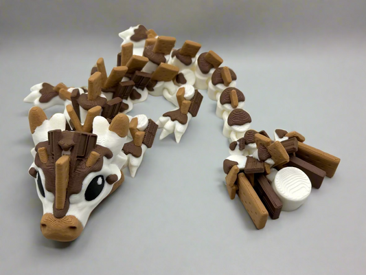 3D printed Baby S’mores Dragon figure with chocolate, marshmallow, and graham cracker design, articulated and flexible.